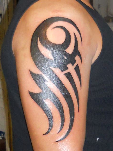 tribal arm tattoo